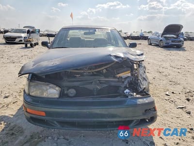 Piąte zdjęcie samochodu w środku: 1994 TOYOTA CAMRY LE VIN:JT2SK12E9R0250330 - miniatura