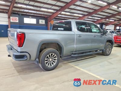 Trzecie zdjęcie samochodu z tyłu: 2020 GMC SIERRA K1500 AT4 VIN:1GTU9EETXLZ375868 - miniatura