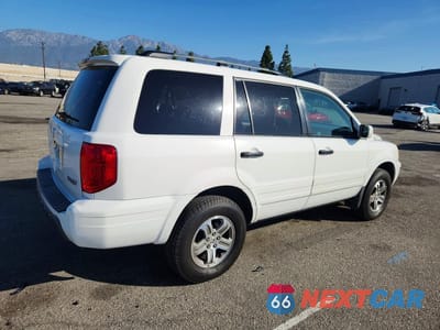 Trzecie zdjęcie samochodu z tyłu: 2003 HONDA PILOT EX VIN:2HKYF18403H591582 - miniatura