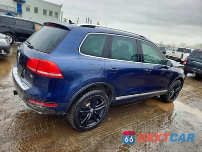 Trzecie zdjęcie samochodu z tyłu: 2014 VOLKSWAGEN TOUAREG V6 TDI VIN:WVGEP9BP4ED010459 - miniatura