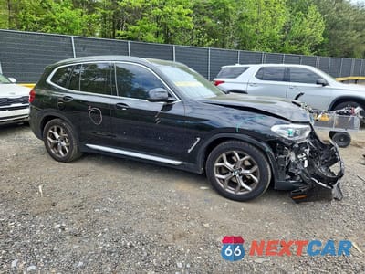 Czwarte zdjęcie samochodu z boku: 2021 BMW X3 XDRIVE30E VIN:5UXTS1C0XM9G87497 - miniatura