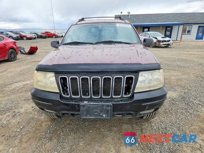 Piąte zdjęcie samochodu w środku: 2001 JEEP GRAND CHEROKEE LAREDO VIN:1J4GW48S41C509187 - miniatura