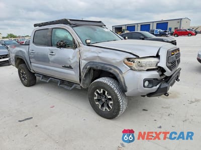 Czwarte zdjęcie samochodu z boku: 2020 TOYOTA TACOMA TRD OFF-ROAD VIN:5TFCZ5AN7LX231385 - miniatura