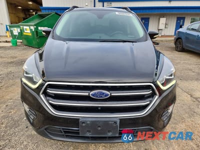 Piąte zdjęcie samochodu w środku: 2017 FORD ESCAPE TITANIUM VIN:1FMCU0JD9HUA10660 - miniatura