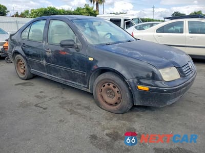 Czwarte zdjęcie samochodu z boku: 2000 VOLKSWAGEN JETTA GL VIN:3VWRC29M7YM038945 - miniatura