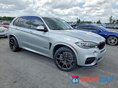 Czwarte zdjęcie samochodu z boku: 2017 BMW X5 XDRIVE50I VIN:5UXKR6C51H0J84514 - miniatura