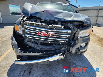 Piąte zdjęcie samochodu w środku: 2015 GMC CANYON SLT VIN:1GTG5CE35F1179692 - miniatura
