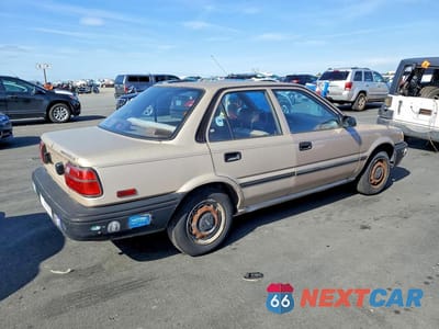 Trzecie zdjęcie samochodu z tyłu: 1991 TOYOTA COROLLA BASE VIN:1NXAE91AXMZ241740 - miniatura