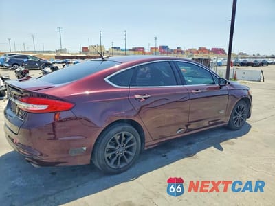 Trzecie zdjęcie samochodu z tyłu: 2017 FORD FUSION TITANIUM PHEV VIN:3FA6P0SUXHR275799 - miniatura