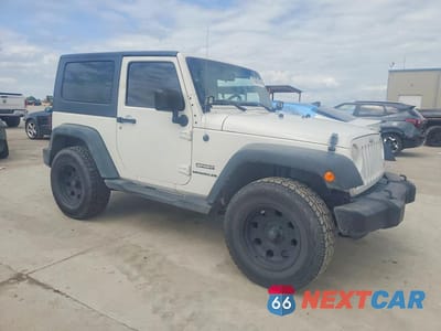 Czwarte zdjęcie samochodu z boku: 2010 JEEP WRANGLER SPORT VIN:1J4AA2D12AL136222 - miniatura