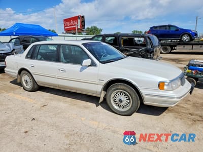 Czwarte zdjęcie samochodu z boku: 1993 LINCOLN CONTINENTL VIN:1LNLM9843PY652177 - miniatura