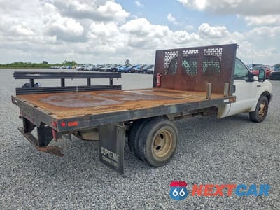 Trzecie zdjęcie samochodu z tyłu: 2003 FORD F350 SUPER DUTY VIN:1FDWF36L73ED73695 - miniatura