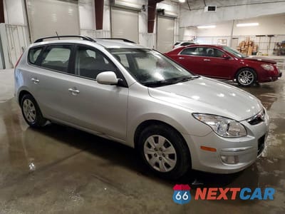 Czwarte zdjęcie samochodu z boku: 2010 HYUNDAI ELANTRA TOURING GLS VIN:KMHDC8AE7AU054855 - miniatura