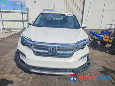Piąte zdjęcie samochodu w środku: 2021 HONDA PILOT EXL VIN:5FNYF5H53MB022368 - miniatura