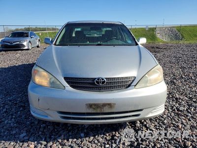 Piąte zdjęcie samochodu w środku: 2003 TOYOTA CAMRY LE VIN:4T1BE32K33U737213 - miniatura