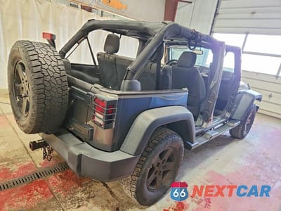 Trzecie zdjęcie samochodu z tyłu: 2016 JEEP WRANGLER UNLIMITED SPORT VIN:1C4BJWDG1GL266118 - miniatura