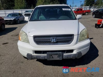 Piąte zdjęcie samochodu w środku: 2005 HONDA PILOT EXL VIN:2HKYF18575H561457 - miniatura