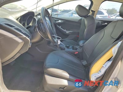 Zdjęcie 7 z 13 samochodu: 2014 FORD FOCUS TITANIUM VIN:1FADP3N26EL299837 - miniatura