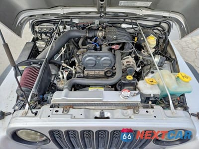Zdjęcie 11 z 12 samochodu: 2004 JEEP WRANGLER / TJ SE VIN:1J4FA29194P724713 - miniatura