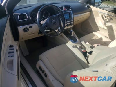 Zdjęcie 8 z 12 samochodu: 2015 VOLKSWAGEN EOS KOMFORT VIN:WVWBW8AH9FV001055 - miniatura