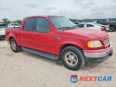 Czwarte zdjęcie samochodu z boku: 2001 FORD F150 SUPERCREW VIN:1FTRW07L31KC50165 - miniatura