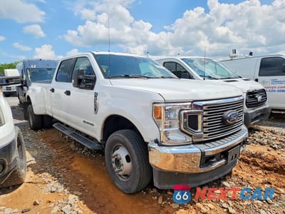Czwarte zdjęcie samochodu z boku: 2021 FORD F350 SUPER DUTY VIN:1FT8W3DT8MED04015 - miniatura