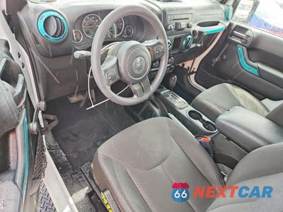 Zdjęcie 8 z 14 samochodu: 2017 JEEP WRANGLER SPORT VIN:1C4AJWAG6HL531102 - miniatura