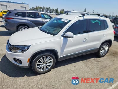 2014 VOLKSWAGEN TIGUAN S WVGAV3AX4EW550496 - główne zdjęcie licytacji z USA - miniatura