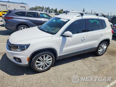 2014 VOLKSWAGEN TIGUAN S WVGAV3AX4EW550496 - główne zdjęcie licytacji z USA - miniatura