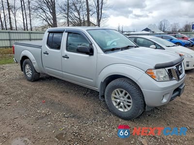 Czwarte zdjęcie samochodu z boku: 2015 NISSAN FRONTIER SV VIN:1N6AD0FV6FN769770 - miniatura