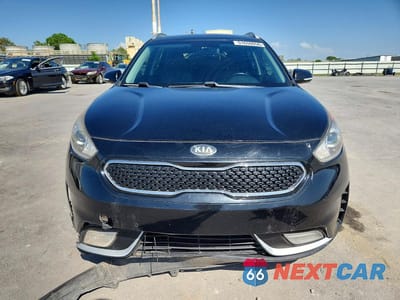 Piąte zdjęcie samochodu w środku: 2017 KIA NIRO EX TOURING VIN:KNDCE3LC5H5052745 - miniatura