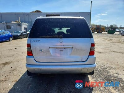 Zdjęcie 6 z 13 samochodu: 2000 MERCEDES-BENZ ML 320 VIN:4JGAB54E6YA221301 - miniatura