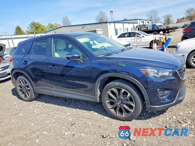 Czwarte zdjęcie samochodu z boku: 2016 MAZDA CX-5 GT VIN:JM3KE4DY8G0654148 - miniatura