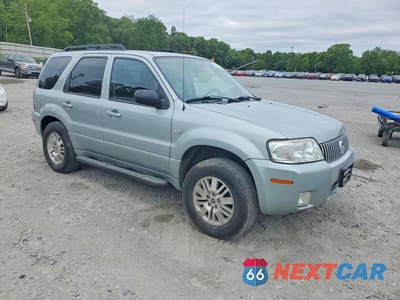 Czwarte zdjęcie samochodu z boku: 2006 MERCURY MARINER VIN:4M2YU56116KJ06615 - miniatura