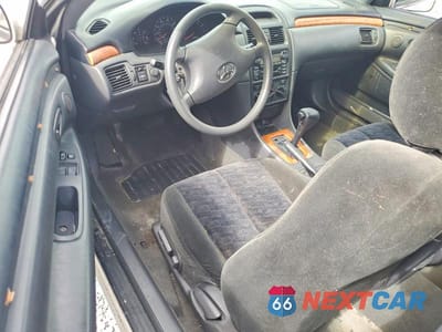 Zdjęcie 8 z 12 samochodu: 2002 TOYOTA CAMRY SOLARA SE VIN:2T1CE22P12C003860 - miniatura