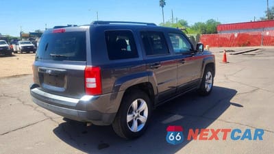 Czwarte zdjęcie samochodu z boku: 2014 JEEP PATRIOT SPORT VIN:1C4NJPBB5ED848790 - miniatura