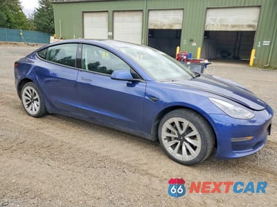 Czwarte zdjęcie samochodu z boku: 2022 TESLA MODEL 3 VIN:5YJ3E1EA7NF371610 - miniatura