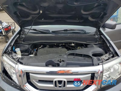 Zdjęcie 12 z 13 samochodu: 2011 HONDA PILOT EXL VIN:5FNYF4H50BB076329 - miniatura