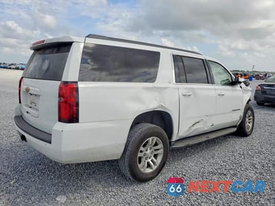 Trzecie zdjęcie samochodu z tyłu: 2019 CHEVROLET SUBURBAN C1500 LT VIN:1GNSCHKC0KR143994 - miniatura