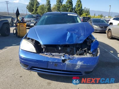 Piąte zdjęcie samochodu w środku: 2005 FORD FOCUS ZX4 VIN:1FAFP34NX5W293588 - miniatura