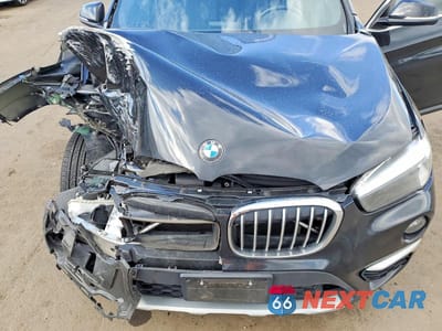 Zdjęcie 11 z 12 samochodu: 2018 BMW X1 XDRIVE28I VIN:WBXHT3C38J5L26315 - miniatura
