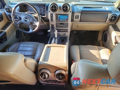 Zdjęcie 8 z 13 samochodu: 2003 HUMMER H2 VIN:5GRGN23U13H107489 - miniatura
