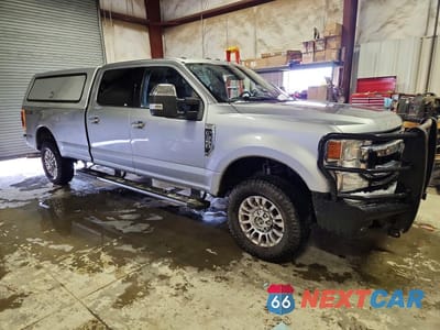 Czwarte zdjęcie samochodu z boku: 2021 FORD F350 SUPER DUTY VIN:1FT8W3BN6MEC28301 - miniatura