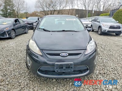 Piąte zdjęcie samochodu w środku: 2011 FORD FIESTA VIN:3FADP4FJ5BM124260 - miniatura
