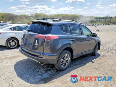 Trzecie zdjęcie samochodu z tyłu: 2016 TOYOTA RAV4 HV XLE VIN:JTMRJREV5GD000379 - miniatura