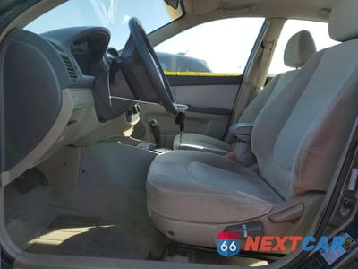 Zdjęcie 7 z 12 samochodu: 2005 KIA SPECTRA VIN:KNAFE122355204590 - miniatura