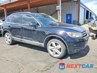 Czwarte zdjęcie samochodu z boku: 2012 VOLKSWAGEN TOUAREG V6 TDI VIN:WVGFK9BPXCD004813 - miniatura