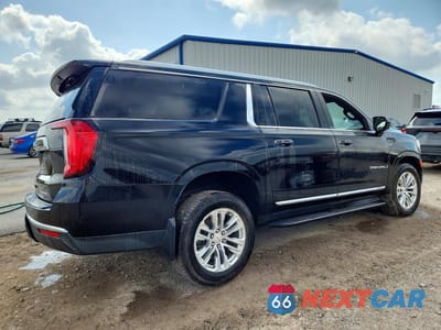 Trzecie zdjęcie samochodu z tyłu: 2021 GMC YUKON XL C1500 SLT VIN:1GKS1GKD1MR463740 - miniatura