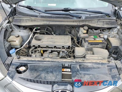 Zdjęcie 12 z 13 samochodu: 2013 HYUNDAI TUCSON LIMITED VIN:KM8JUCAC6DU690592 - miniatura
