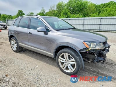 Czwarte zdjęcie samochodu z boku: 2011 VOLKSWAGEN TOUAREG V6 VIN:WVGFF9BP6BD000664 - miniatura